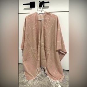 Gental Fawn light knitted poncho.